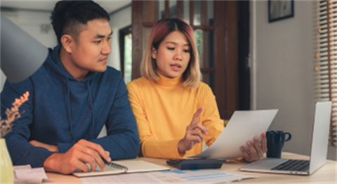 Couple reviewing a bill