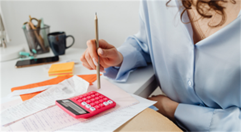 Person with calculator