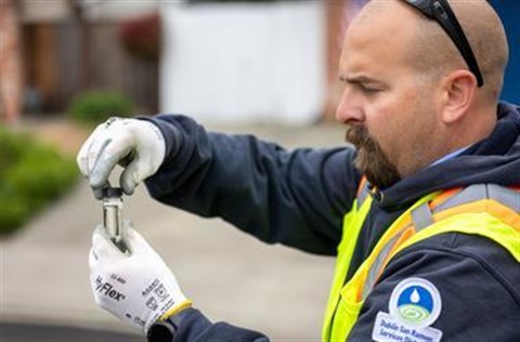 Staff with Water Quality Sample