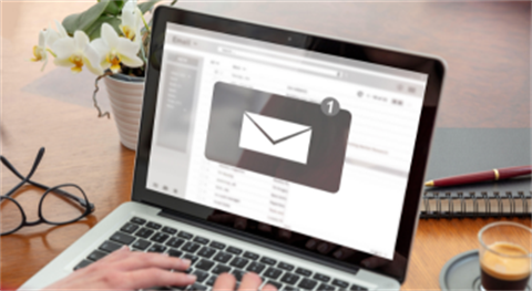 Person viewing email on laptop